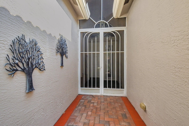8127 Playa Del Sur Blvd, Lake Worth, FL 33467 - property entrance featuring stucco siding and a patio