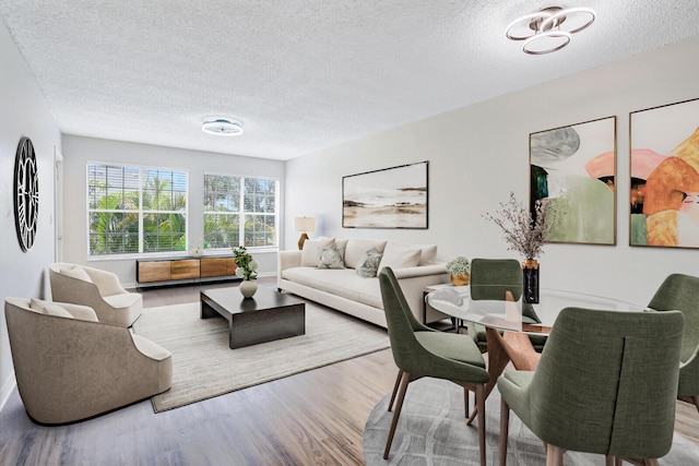 6315 La Costa Dr Unit G, Boca Raton, FL 33433 - living room featuring wood finished floors and a textured ceiling