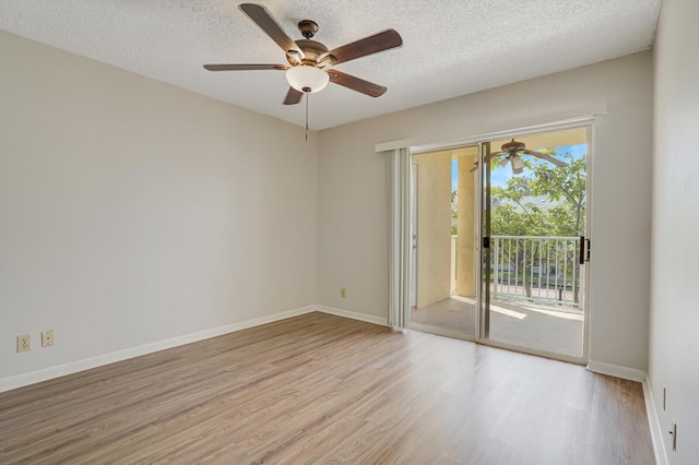 6315 La Costa Dr Unit G, Boca Raton, FL 33433 - spare room with wood finished floors, a ceiling fan, baseboards, and a textured ceiling