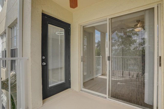 6315 La Costa Dr Unit G, Boca Raton, FL 33433 - doorway to property featuring stucco siding