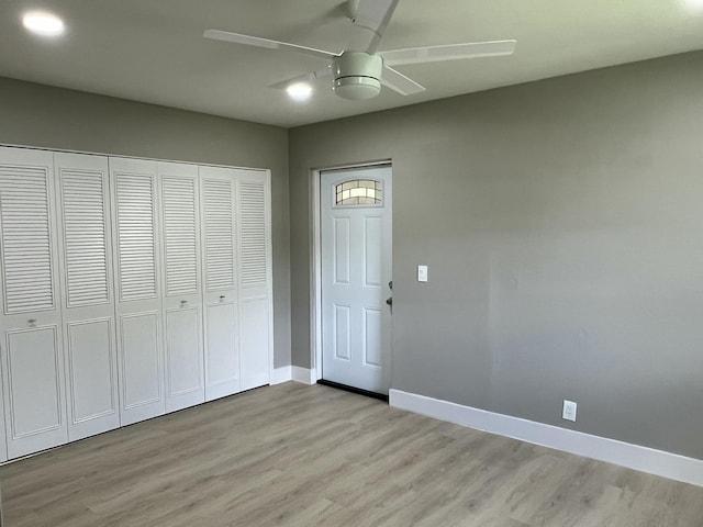 267 Flanders F, Delray Beach, FL 33484 - entrance foyer with light wood-style floors and ceiling fan