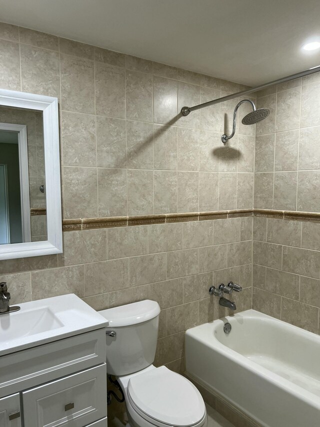 267 Flanders F, Delray Beach, FL 33484 - full bath with  shower combination, vanity, and tile walls