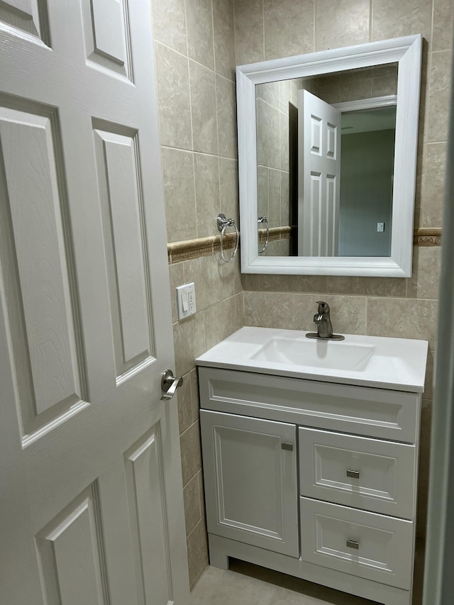 267 Flanders F, Delray Beach, FL 33484 - bathroom featuring tile walls and vanity