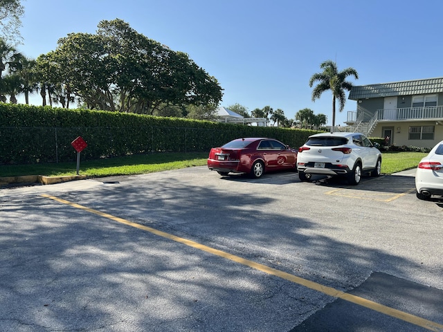 267 Flanders F, Delray Beach, FL 33484 - uncovered parking lot with stairway
