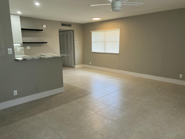 267 Flanders F, Delray Beach, FL 33484 - unfurnished room with a ceiling fan, light tile patterned flooring, and recessed lighting