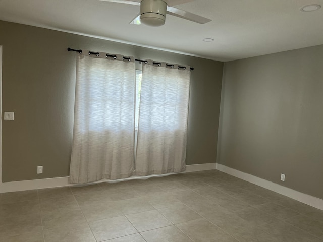 267 Flanders F, Delray Beach, FL 33484 - unfurnished room with ceiling fan and light tile patterned floors