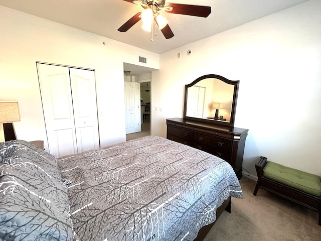 5205 Myrtlewood Cir E, Palm Beach Gardens, FL 33418 - carpeted bedroom featuring a closet and a ceiling fan