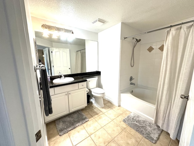 5205 Myrtlewood Cir E, Palm Beach Gardens, FL 33418 - bathroom with tile patterned floors, vanity, a textured ceiling, shower / bath combo, and toilet
