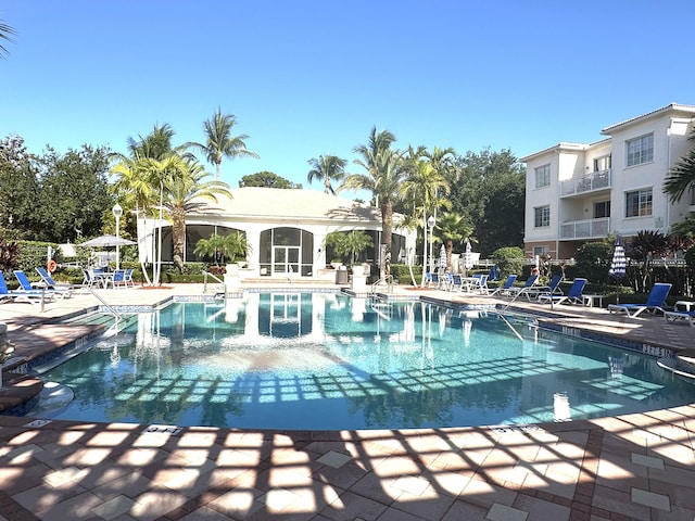 5205 Myrtlewood Cir E, Palm Beach Gardens, FL 33418 - community pool featuring a patio