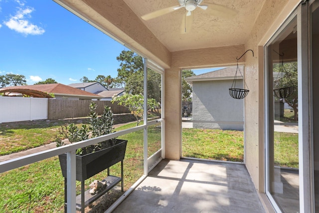 1413 Amaryllis Ln, West Palm Beach, FL 33415 - unfurnished sunroom featuring ceiling fan