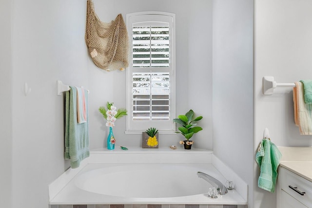 1025 Whitetail Ave SW, Vero Beach, FL 32968 - full bath with a garden tub and vanity