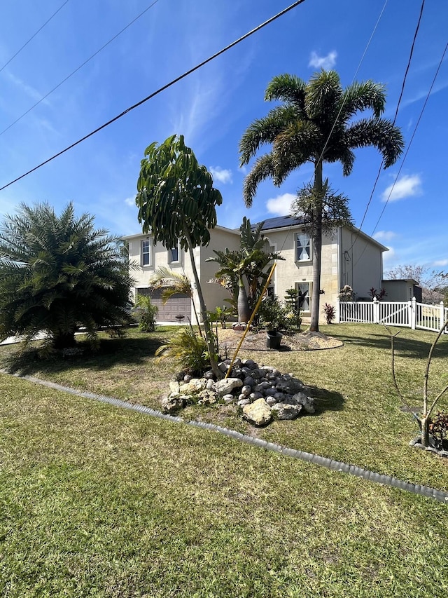 991 SE Bywood Ave, Port Saint Lucie, FL 34983 - view of front facade with stucco siding