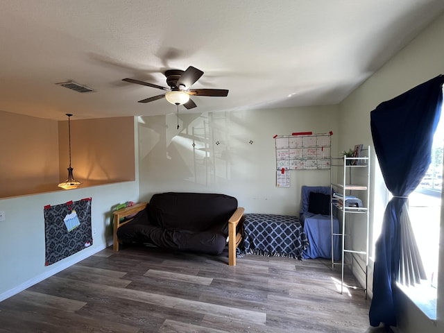 991 SE Bywood Ave, Port Saint Lucie, FL 34983 - sitting room with ceiling fan, wood finished floors, and baseboards