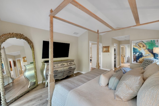 4164 Saint Andrews Dr, Boynton Beach, FL 33436 - bedroom featuring wood finished floors, lofted ceiling, and ensuite bath