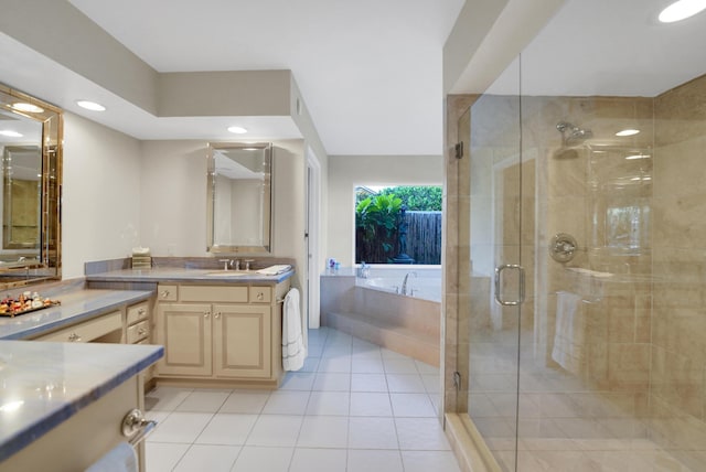 4164 Saint Andrews Dr, Boynton Beach, FL 33436 - bathroom featuring vanity, a bath, a shower stall, tile patterned flooring, and recessed lighting