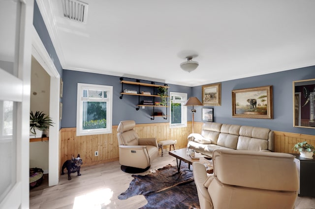 4164 Saint Andrews Dr, Boynton Beach, FL 33436 - living room featuring wainscoting, wood walls, wood finished floors, and ornamental molding