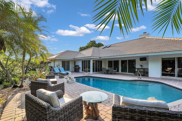 4164 Saint Andrews Dr, Boynton Beach, FL 33436 - outdoor pool with a patio, area for grilling, and outdoor dining space