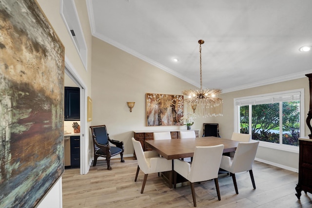 4164 Saint Andrews Dr, Boynton Beach, FL 33436 - dining space featuring ornamental molding, light wood finished floors, recessed lighting, and a chandelier