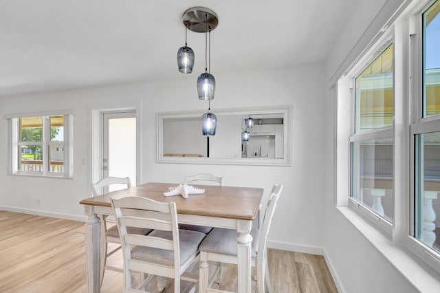 229 Chatham K, West Palm Beach, FL 33417 - dining area featuring baseboards and wood finished floors