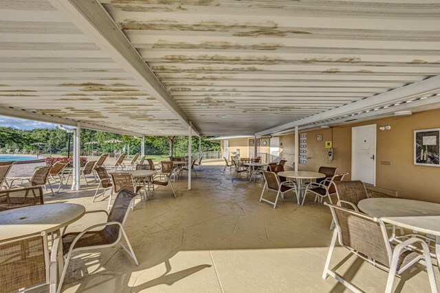 229 Chatham K, West Palm Beach, FL 33417 - view of patio / terrace featuring outdoor dining area
