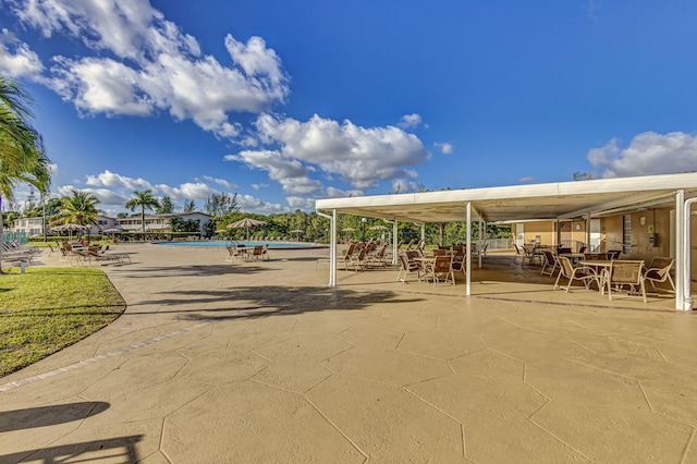 229 Chatham K, West Palm Beach, FL 33417 - view of home's community featuring a patio and a swimming pool