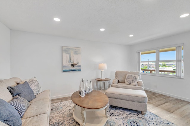 229 Chatham K, West Palm Beach, FL 33417 - living room featuring wood finished floors, recessed lighting, and baseboards