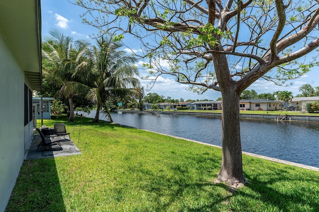 7307 NW 58th Ct, Tamarac, FL 33321 - view of green lawn with a water view