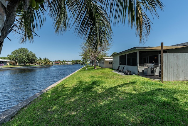 7307 NW 58th Ct, Tamarac, FL 33321 - view of grassy yard with a water view