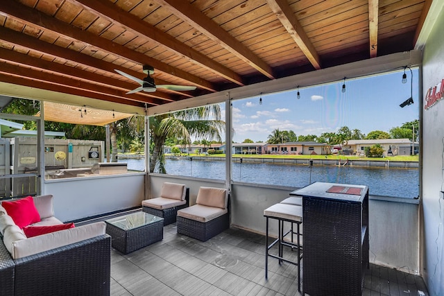 7307 NW 58th Ct, Tamarac, FL 33321 - view of patio / terrace with an outdoor hangout area, a ceiling fan, and a deck with water view
