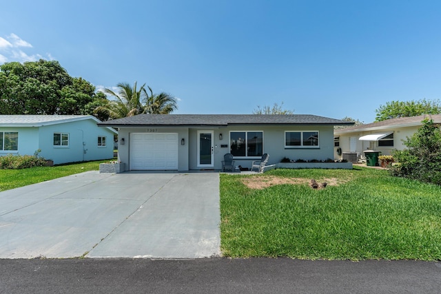 7307 NW 58th Ct, Tamarac, FL 33321 - ranch-style house with a garage, stucco siding, a front yard, and concrete driveway
