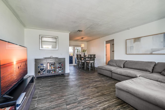 7307 NW 58th Ct, Tamarac, FL 33321 - living room featuring dark wood-type flooring, ornamental molding, and baseboards