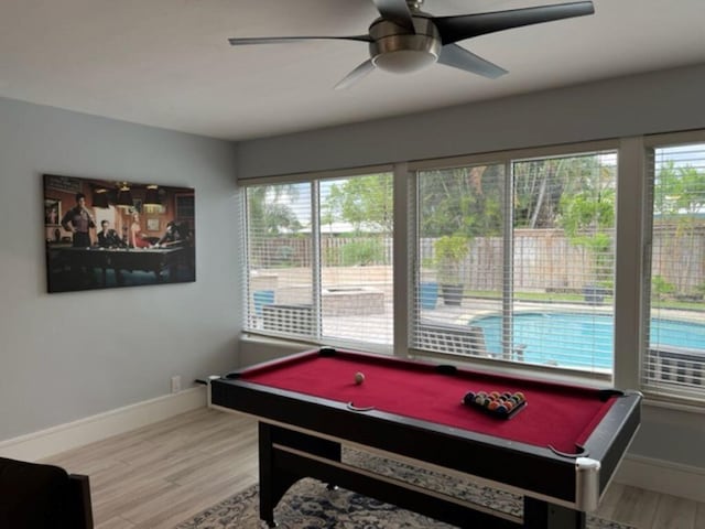 501 SE 13th Ct, Pompano Beach, FL 33060 - playroom with plenty of natural light, billiards table, wood finished floors, and baseboards