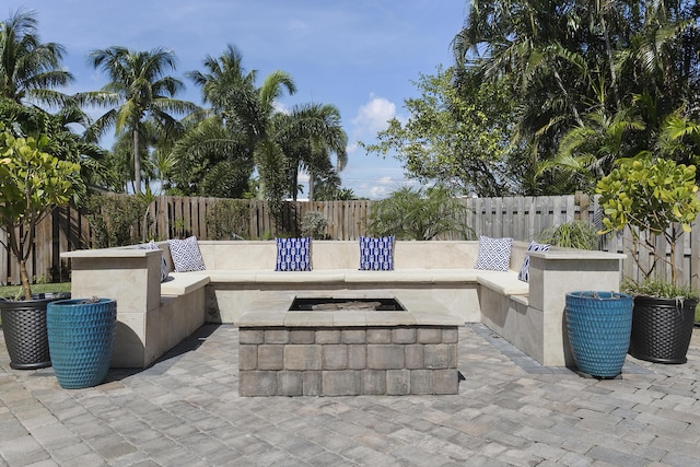 501 SE 13th Ct, Pompano Beach, FL 33060 - view of patio featuring an outdoor fire pit