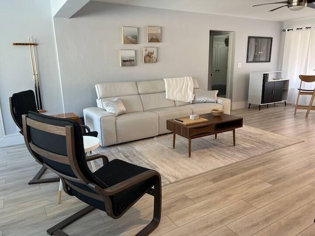 501 SE 13th Ct, Pompano Beach, FL 33060 - living room featuring a ceiling fan, light wood-type flooring, and baseboards