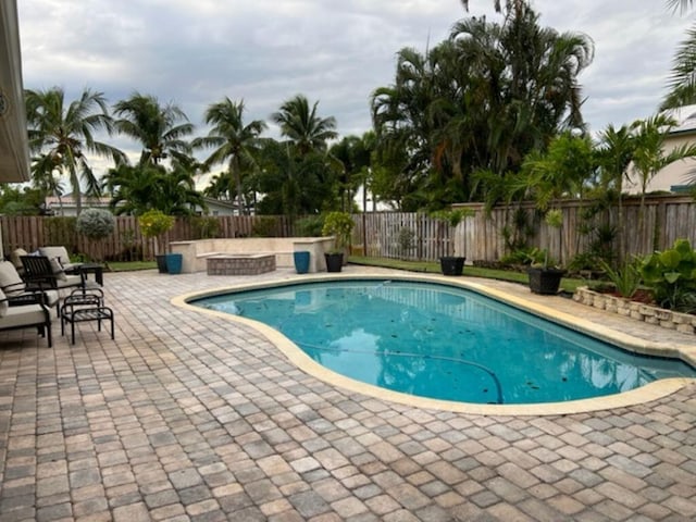 501 SE 13th Ct, Pompano Beach, FL 33060 - view of swimming pool with a patio area and a fenced backyard