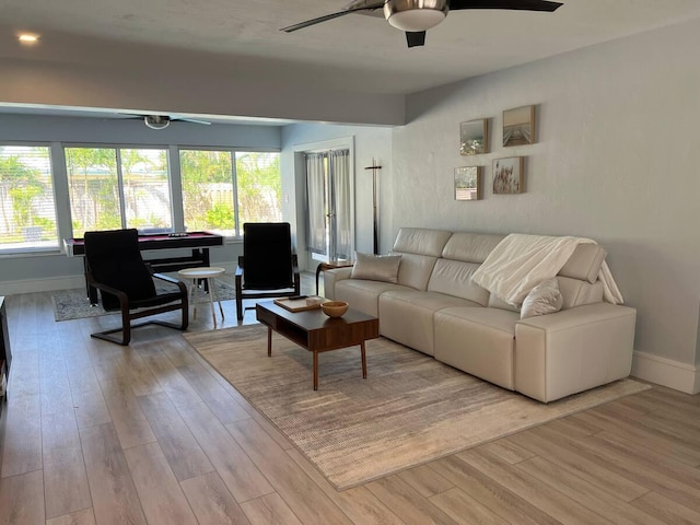 501 SE 13th Ct, Pompano Beach, FL 33060 - living room with ceiling fan, wood finished floors, and baseboards