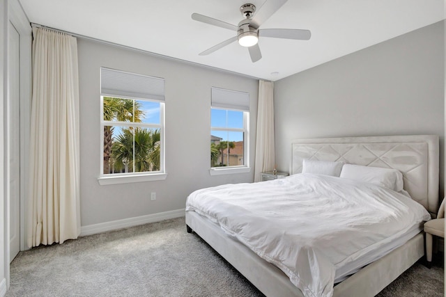 5322 Yellow Water Lily Ct, Lake Worth, FL 33467 - carpeted bedroom with baseboards and ceiling fan