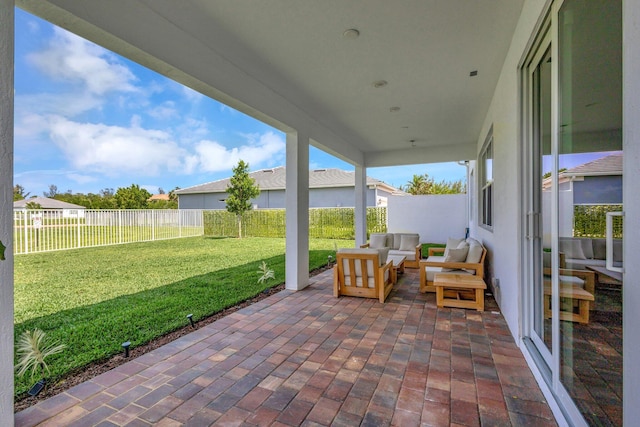 5322 Yellow Water Lily Ct, Lake Worth, FL 33467 - view of patio / terrace featuring an outdoor hangout area