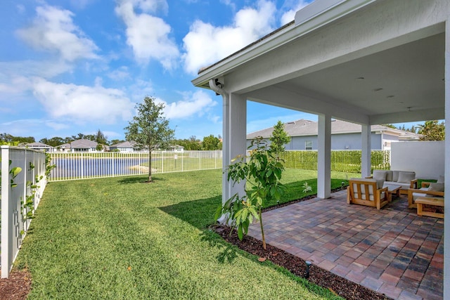 5322 Yellow Water Lily Ct, Lake Worth, FL 33467 - view of yard with a patio, an outdoor living space, a water view, and a residential view