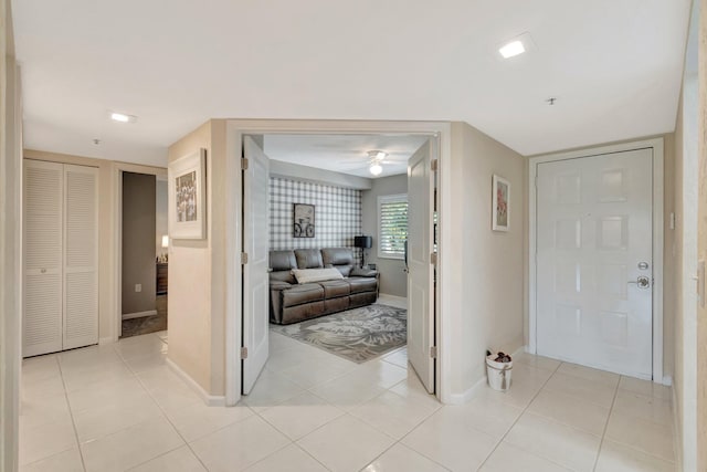 5914 Regal Glen Dr Unit 107, Boynton Beach, FL 33437 - foyer entrance featuring baseboards, a ceiling fan, and light tile patterned floors
