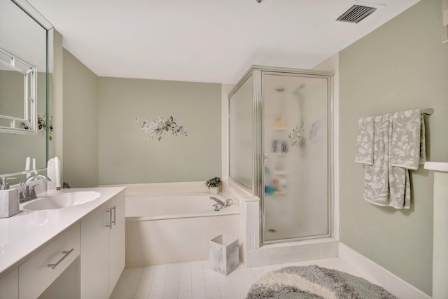 5914 Regal Glen Dr Unit 107, Boynton Beach, FL 33437 - full bathroom with vanity, a stall shower, and a bath