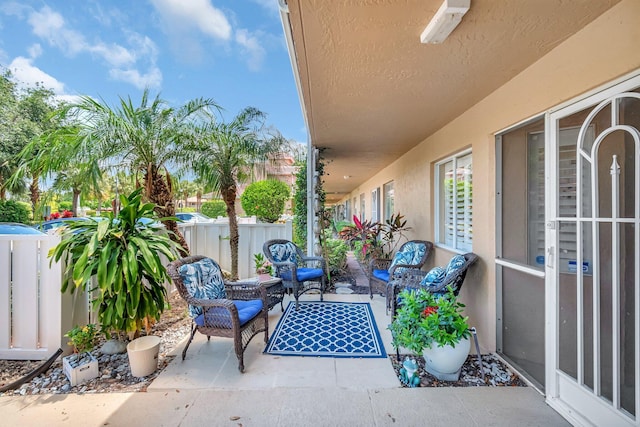 5914 Regal Glen Dr Unit 107, Boynton Beach, FL 33437 - view of patio with outdoor lounge area