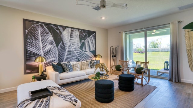 1553 SE Crosswood Way, Port Saint Lucie, FL 34984 - living area featuring a ceiling fan, wood finished floors, baseboards, and recessed lighting