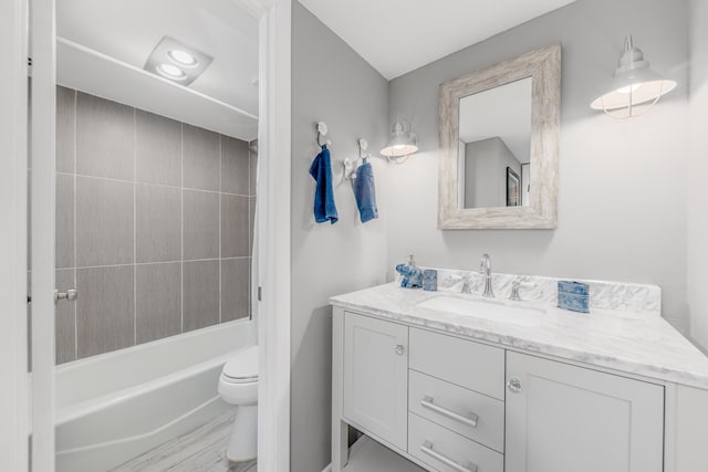 390 NE Edgewater Dr Unit 302, Stuart, FL 34996 - full bathroom with vanity, toilet, and shower / bath combo
