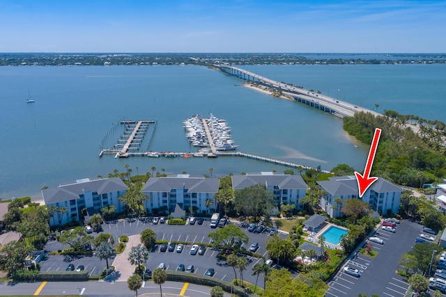 390 NE Edgewater Dr Unit 302, Stuart, FL 34996 - aerial overview of property's location featuring a large body of water and a notable bridge