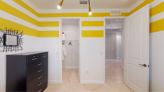 1097 SE Crosswood Way, Port Saint Lucie, FL 34984 - unfurnished bedroom with a spacious closet, a closet, and baseboards