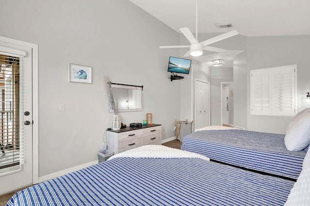 9927 Perfect Dr Unit 108, Port Saint Lucie, FL 34986 - bedroom with vaulted ceiling, baseboards, and a ceiling fan