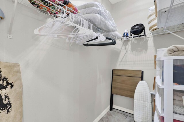 9927 Perfect Dr Unit 108, Port Saint Lucie, FL 34986 - spacious closet with wood finished floors