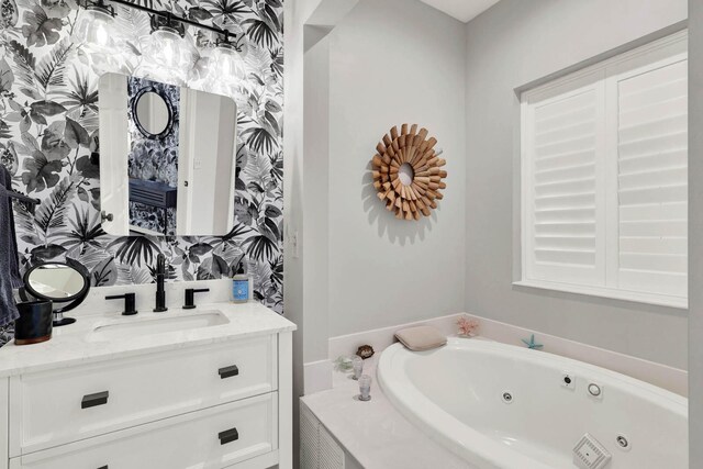9927 Perfect Dr Unit 108, Port Saint Lucie, FL 34986 - bathroom with vanity and a tub with jets