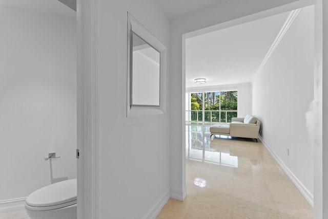 550 SE Mizner Blvd Unit B206, Boca Raton, FL 33432 - corridor featuring baseboards